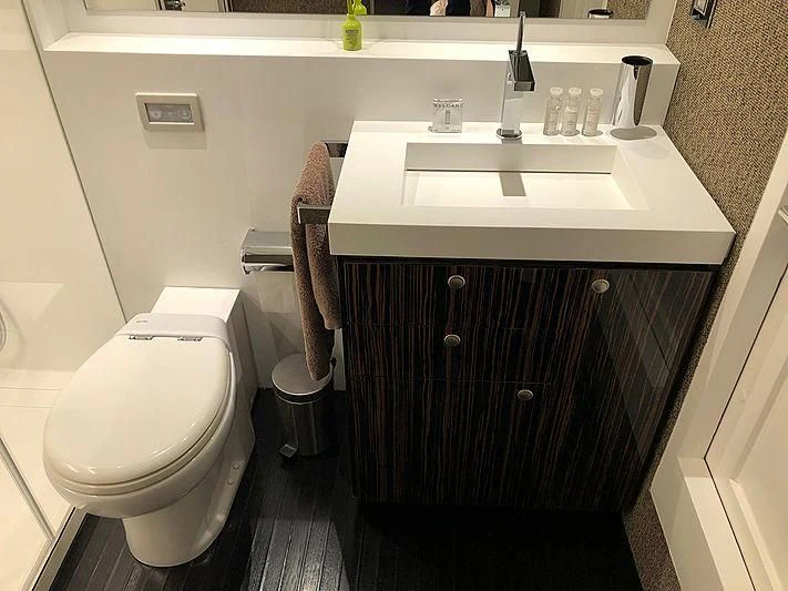 a bathroom with a sink and a toilet aboard RA Yacht for Sale
