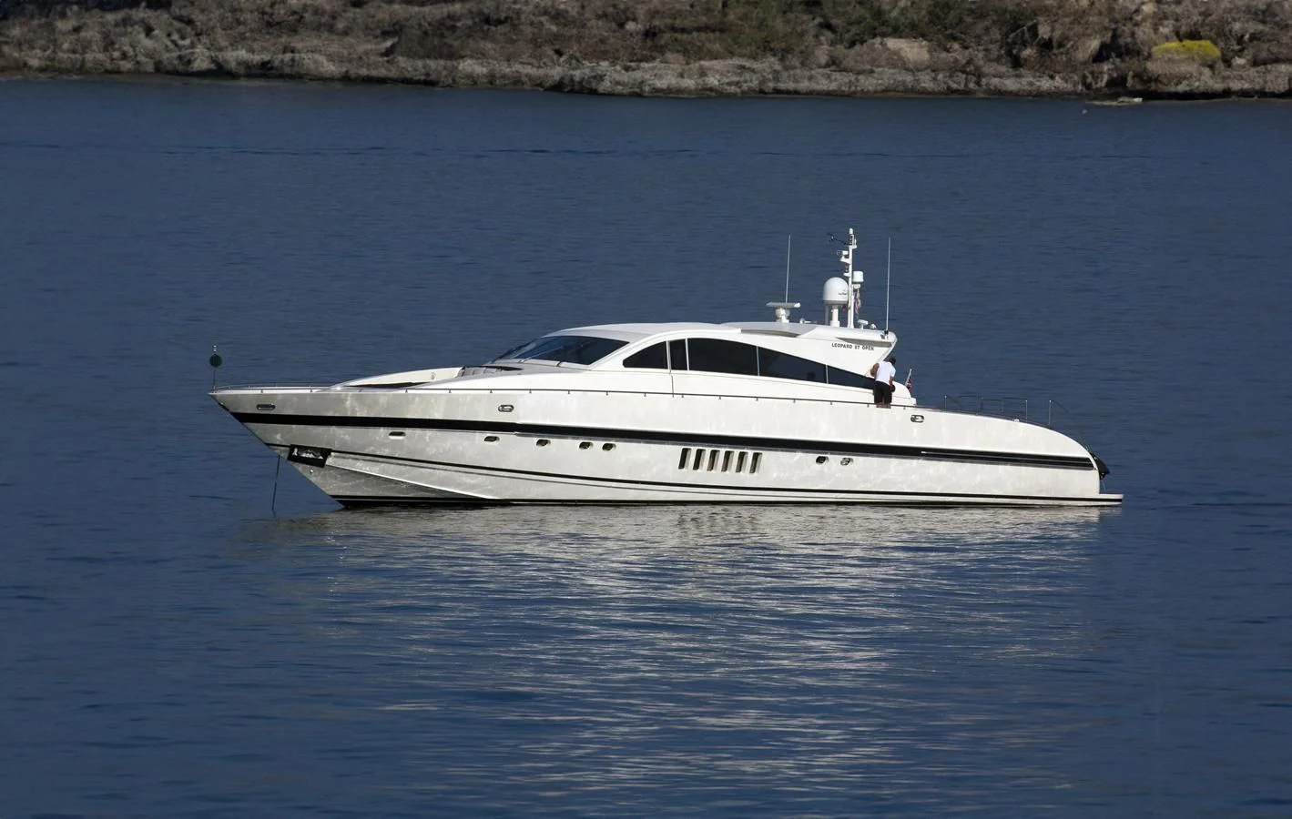 a white boat in the water aboard NAISCA IV Yacht for Sale