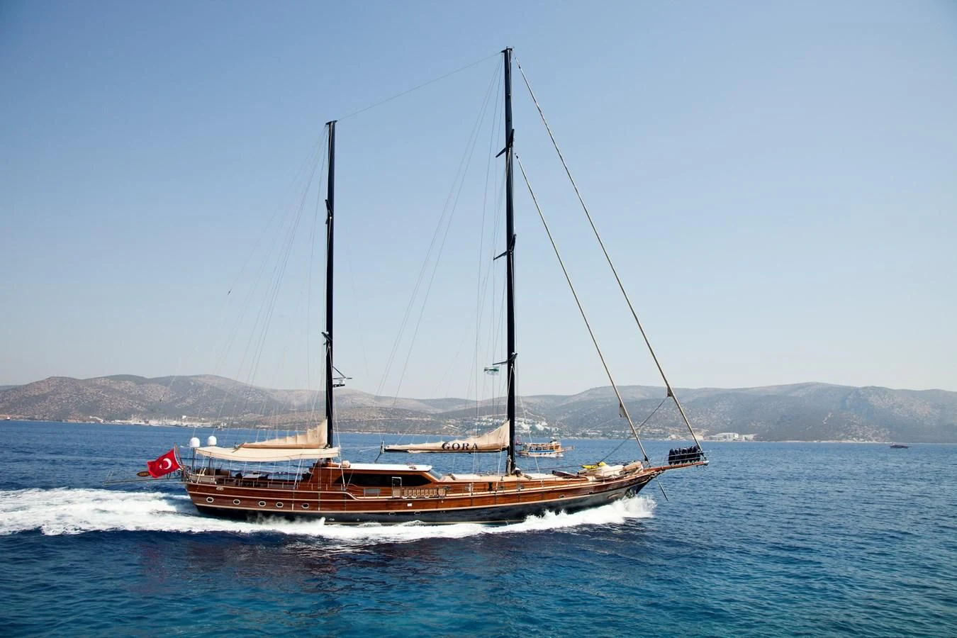 a boat sailing on the sea aboard PERFORMANCE FEE Yacht for Sale
