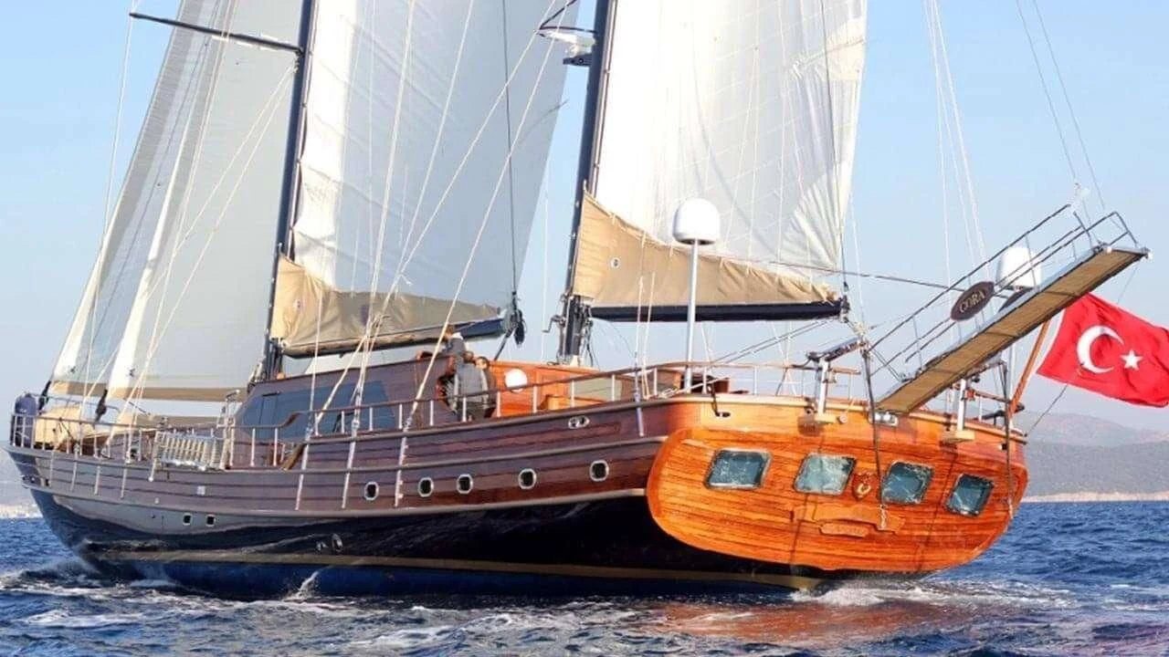 a boat on the water aboard PERFORMANCE FEE Yacht for Sale