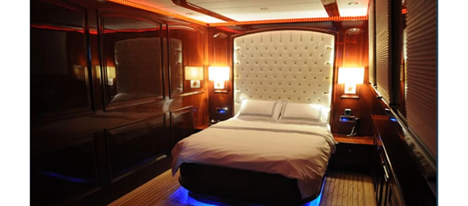 a room with a bed and a window aboard PERFORMANCE FEE Yacht for Sale