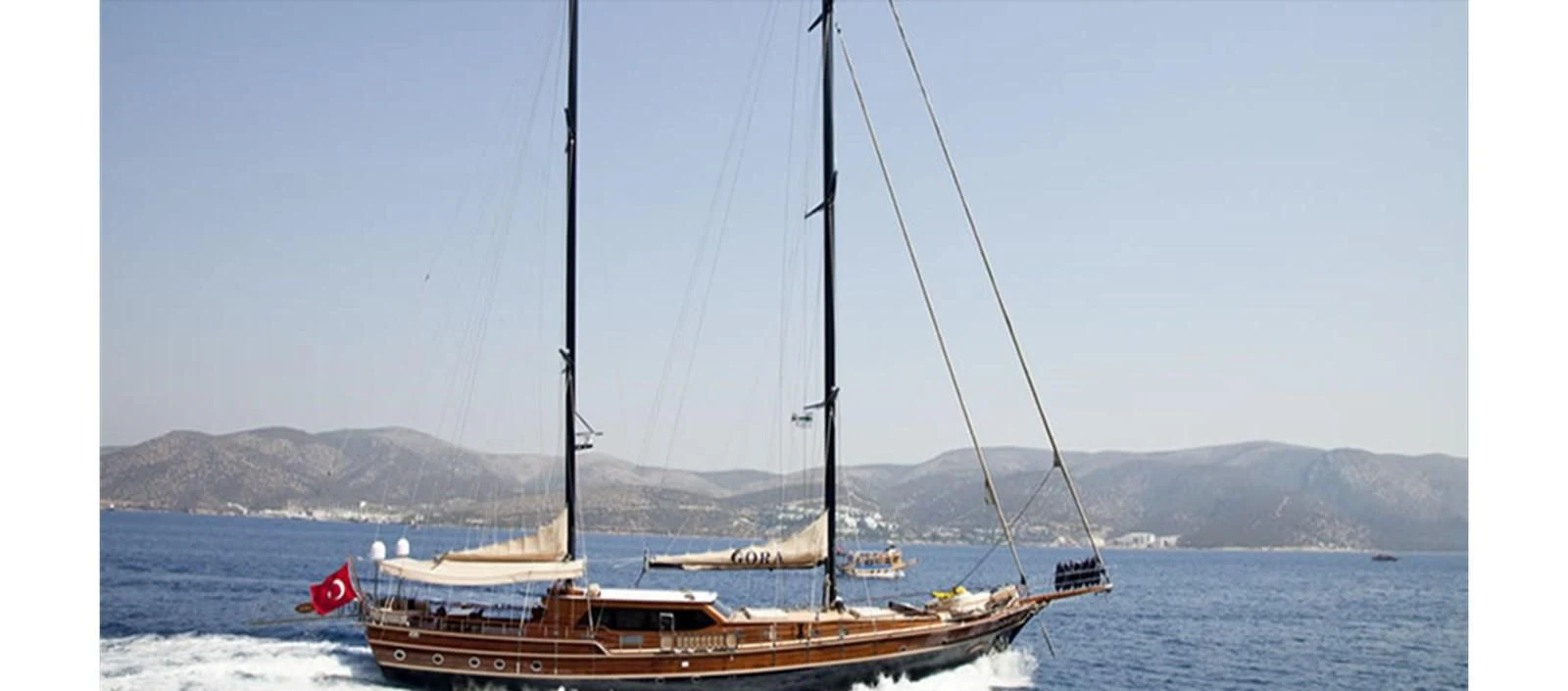 a boat on the water aboard PERFORMANCE FEE Yacht for Sale