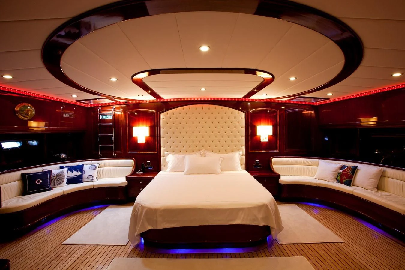 a room with a bed and a couch aboard PERFORMANCE FEE Yacht for Sale