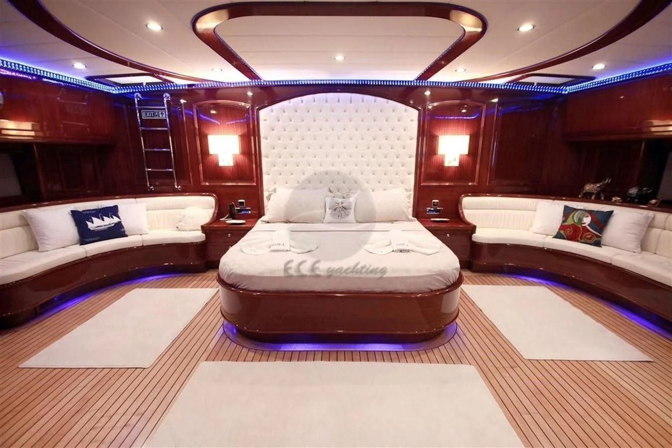 a room with a bed and a couch aboard PERFORMANCE FEE Yacht for Sale