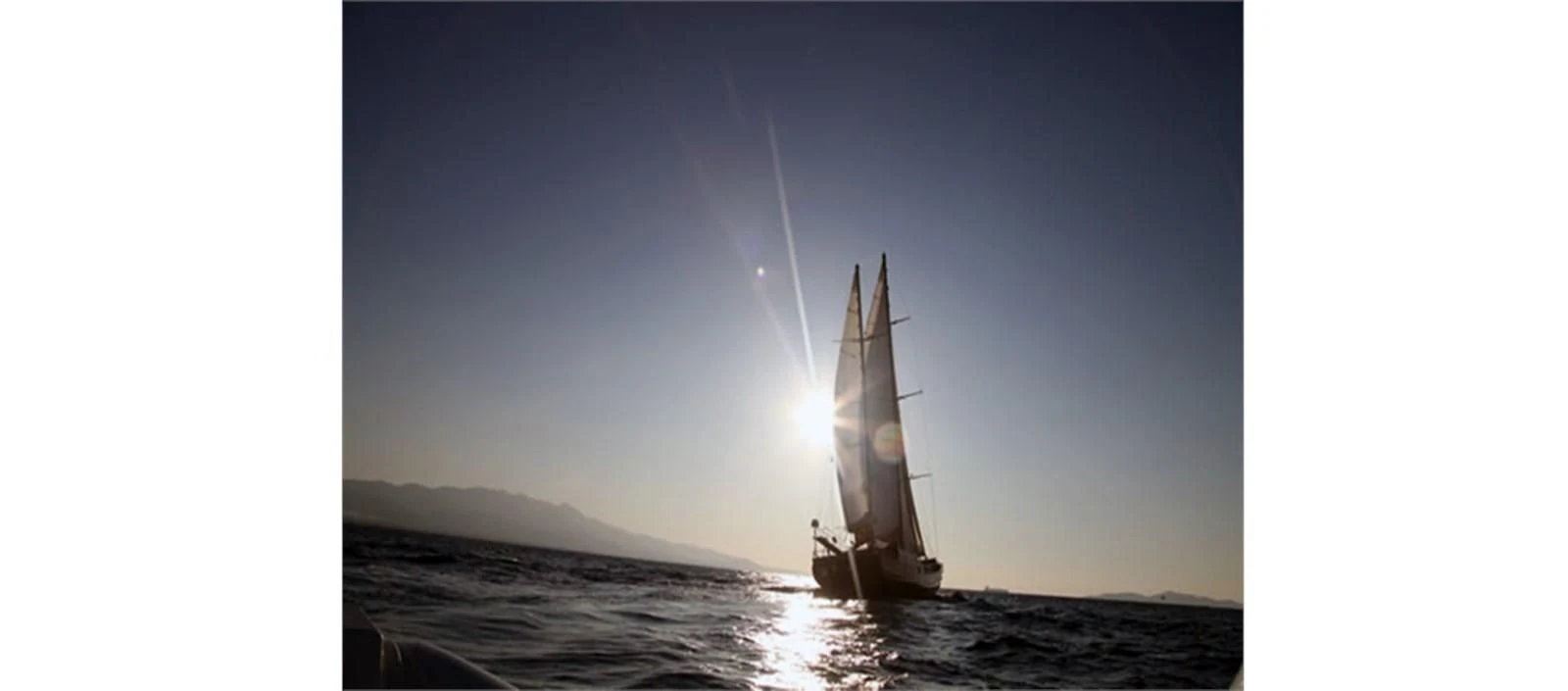 a rocket ship in the water aboard PERFORMANCE FEE Yacht for Sale