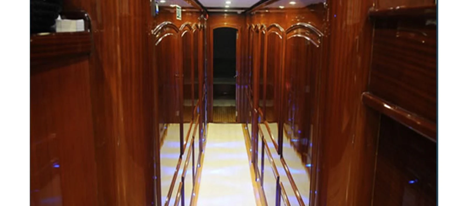 a hallway with wood cabinets aboard PERFORMANCE FEE Yacht for Sale