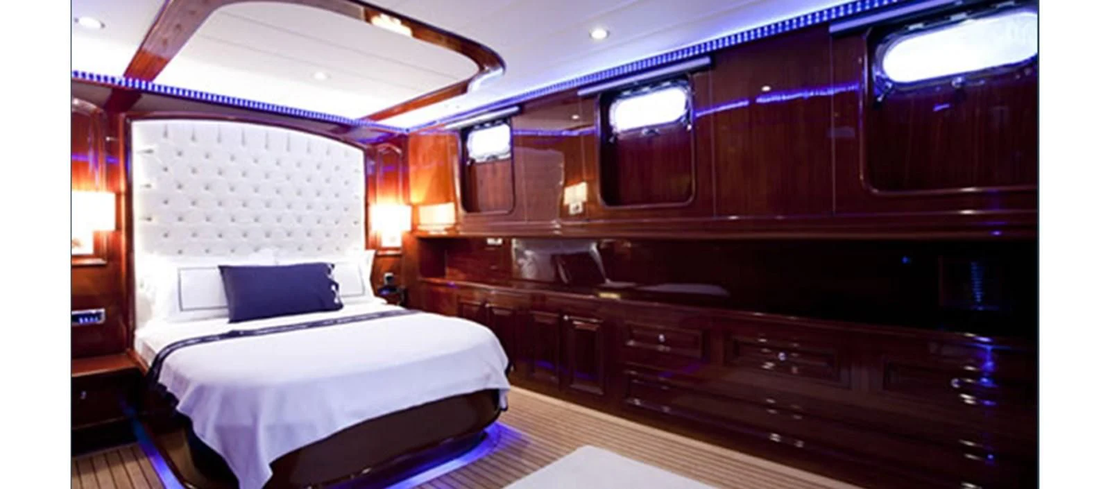 a room with two beds aboard PERFORMANCE FEE Yacht for Sale