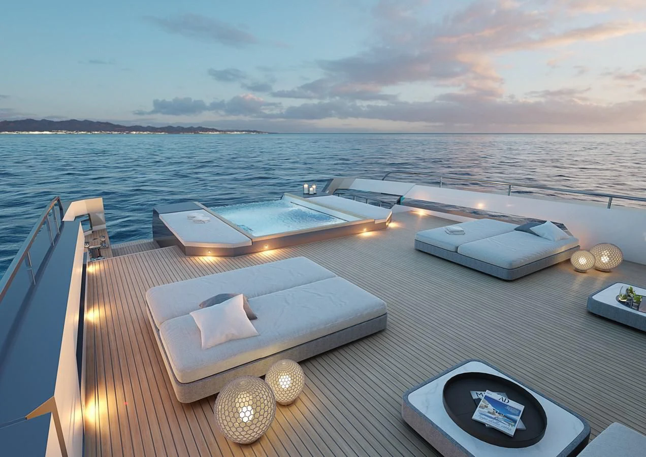 a deck with a view of the ocean and the land below aboard CROSSOVER Yacht for Sale