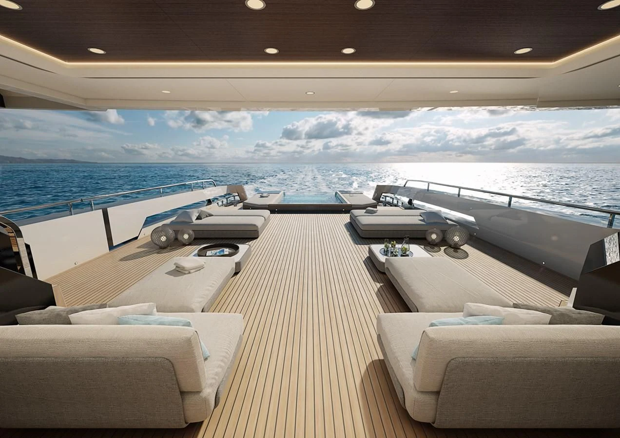 a deck with a view of the ocean and the deck aboard CROSSOVER Yacht for Sale