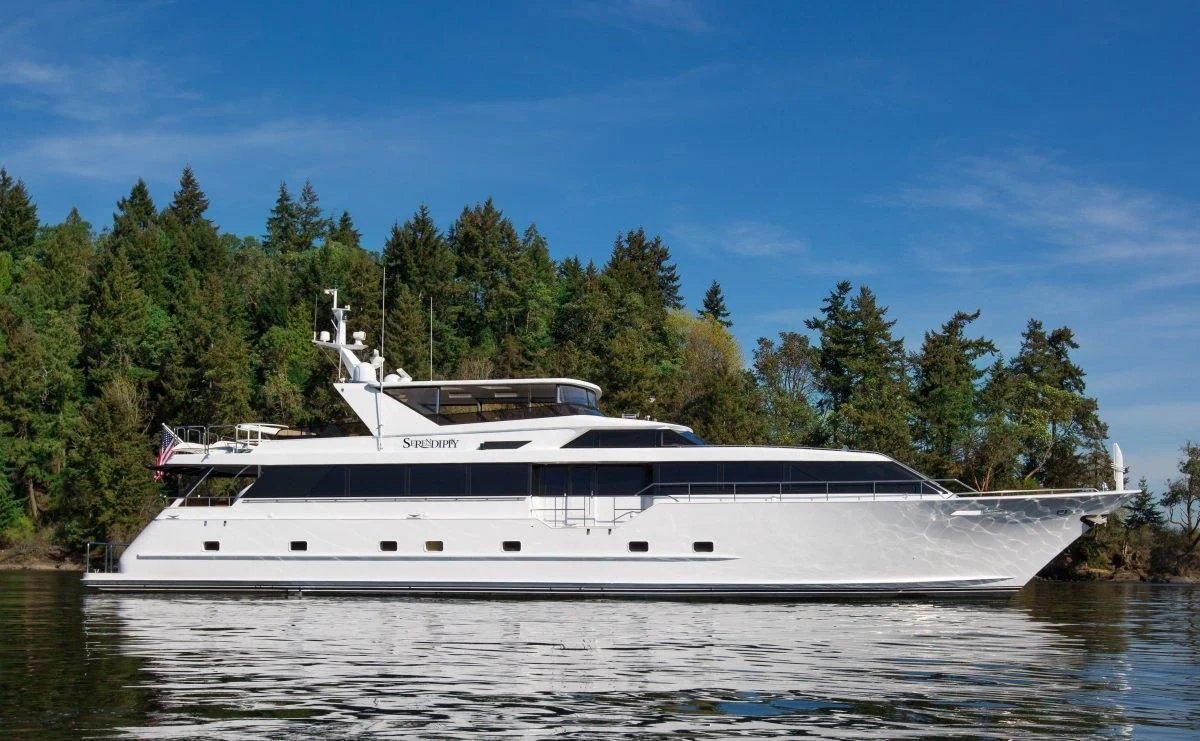 a white yacht on the water aboard BLACKWOOD Yacht for Sale