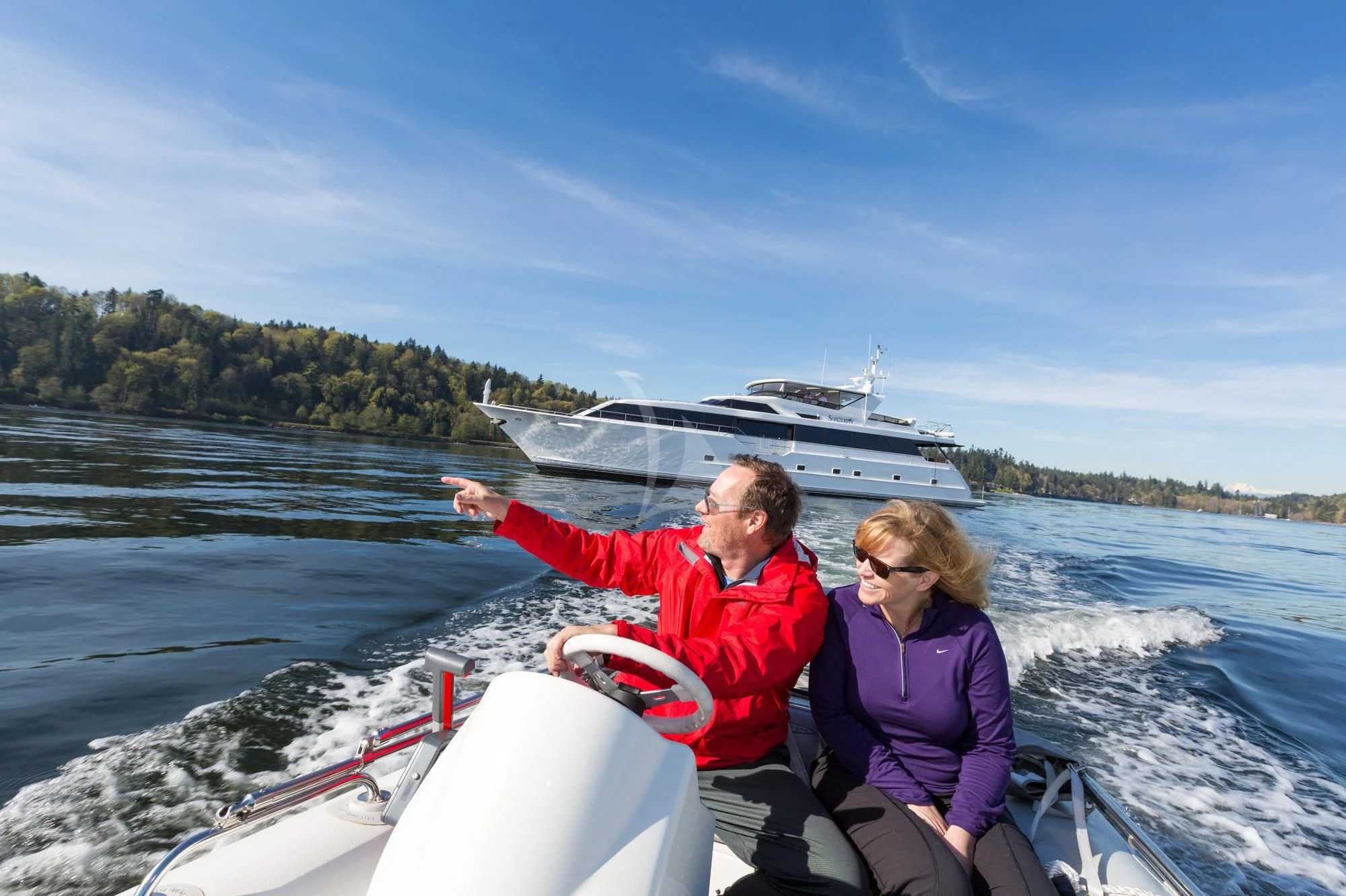 a man and woman on a boat aboard BLACKWOOD Yacht for Sale