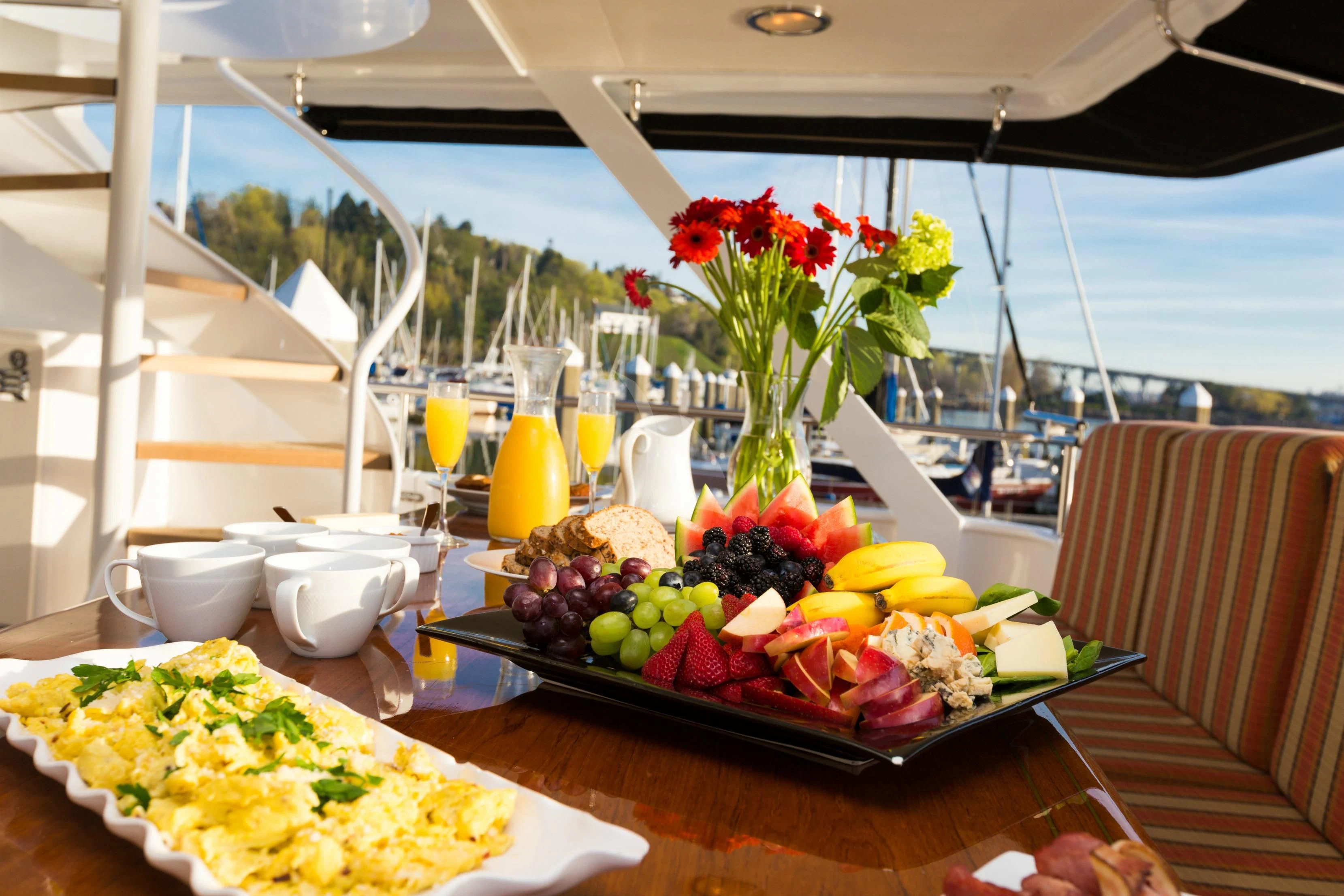 a table with food on it aboard BLACKWOOD Yacht for Sale