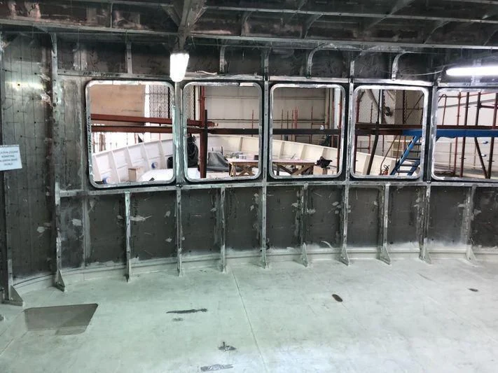 a room with a window and a light aboard BLUE II Yacht for Charter