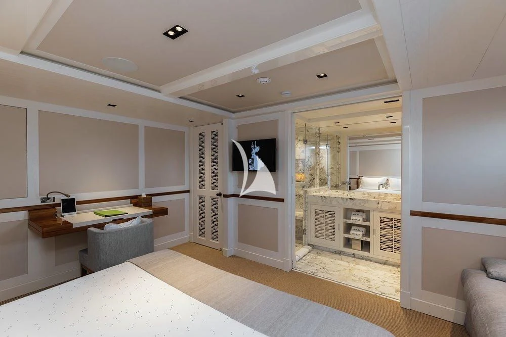 a living room with a large open door aboard BLUE II Yacht for Charter