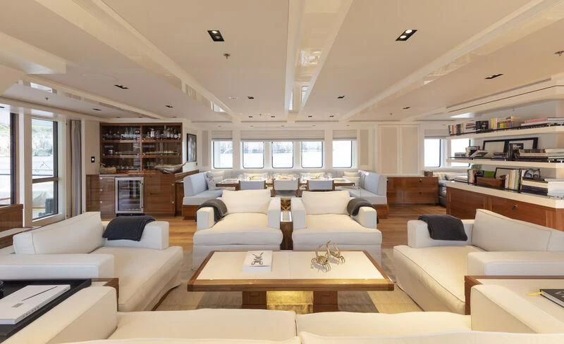 a living room with a large window aboard BLUE II Yacht for Charter