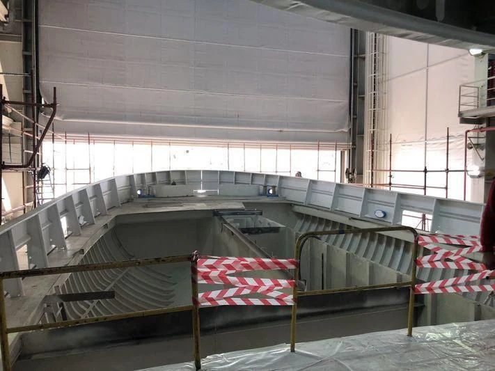 a large room with chairs and a table aboard BLUE II Yacht for Charter