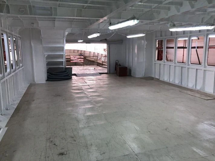 a room with a staircase and a staircase aboard BLUE II Yacht for Charter