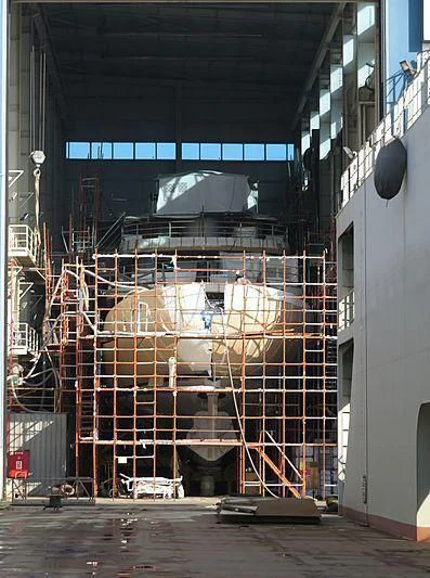 a large chicken in a cage aboard BLUE II Yacht for Charter