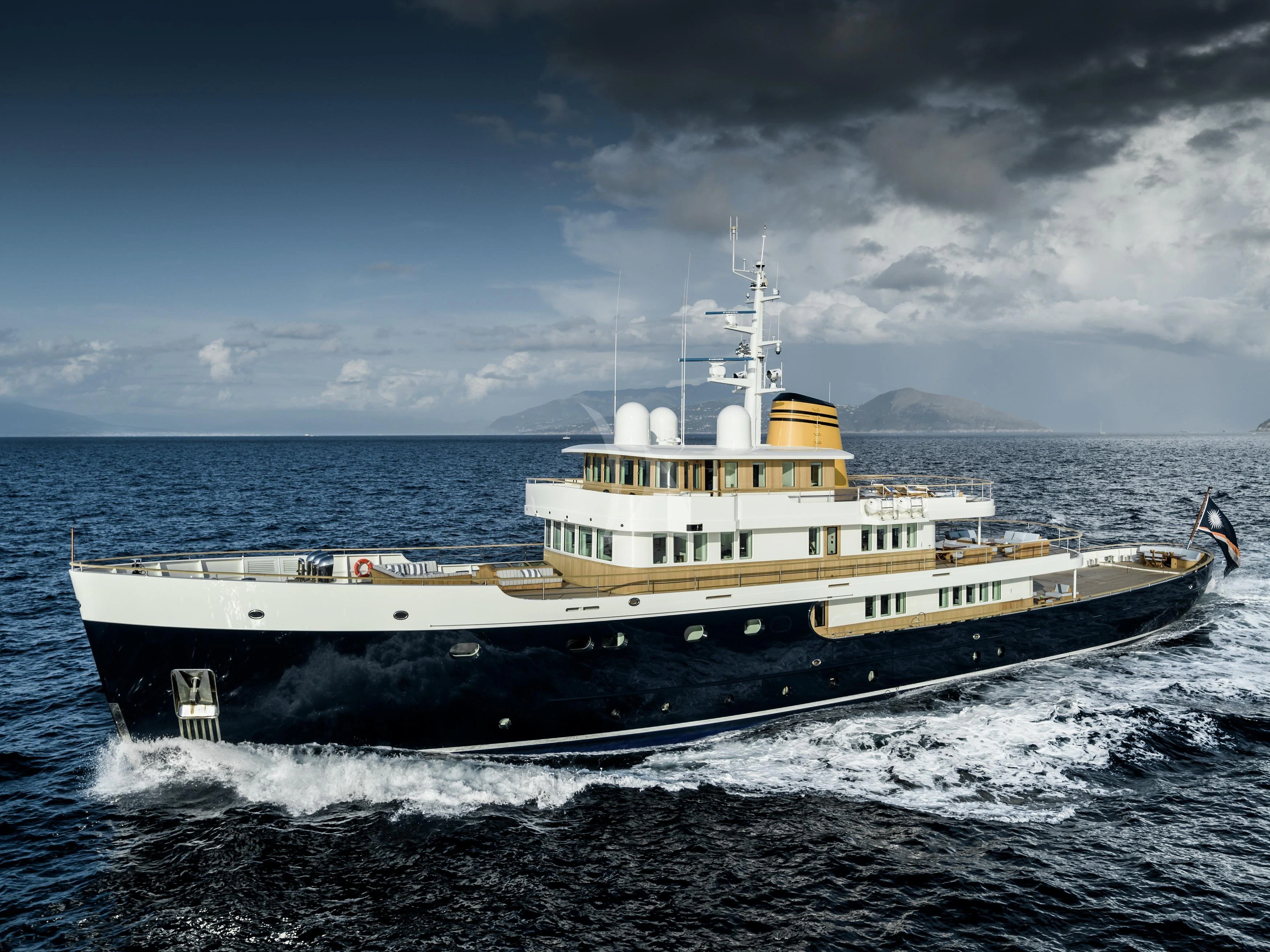 a large white boat in the water aboard BLUE II Yacht for Charter