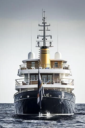 a large ship in the water aboard BLUE II Yacht for Charter