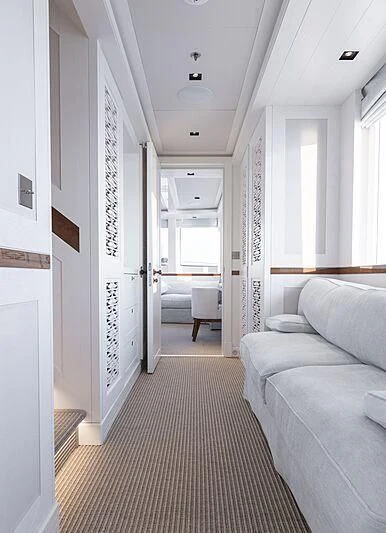 a room with a couch and a bed aboard BLUE II Yacht for Charter