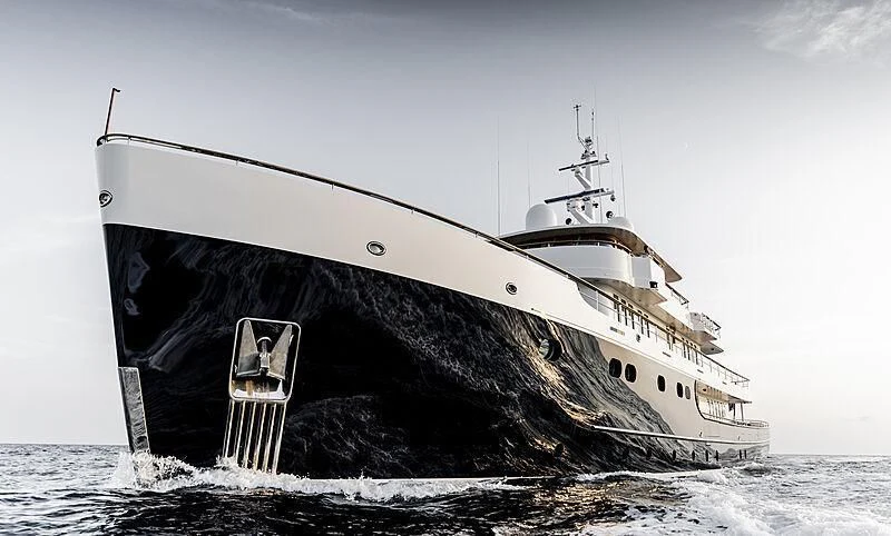 a large ship in the water aboard BLUE II Yacht for Charter