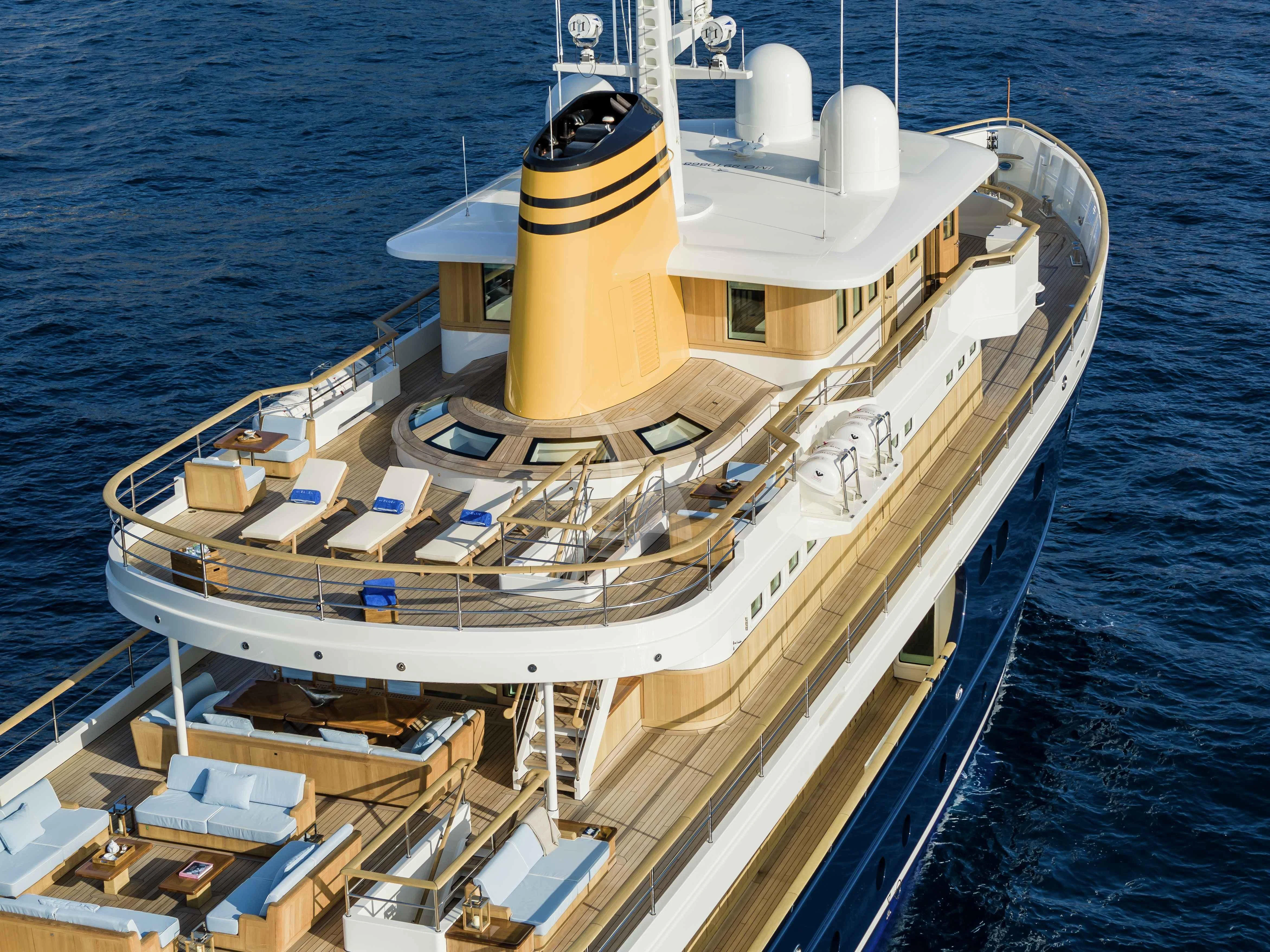 a large white ship in the water aboard BLUE II Yacht for Charter
