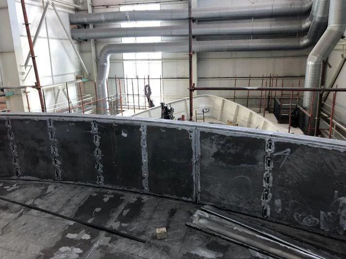 a large room with pipes and tubes aboard BLUE II Yacht for Charter