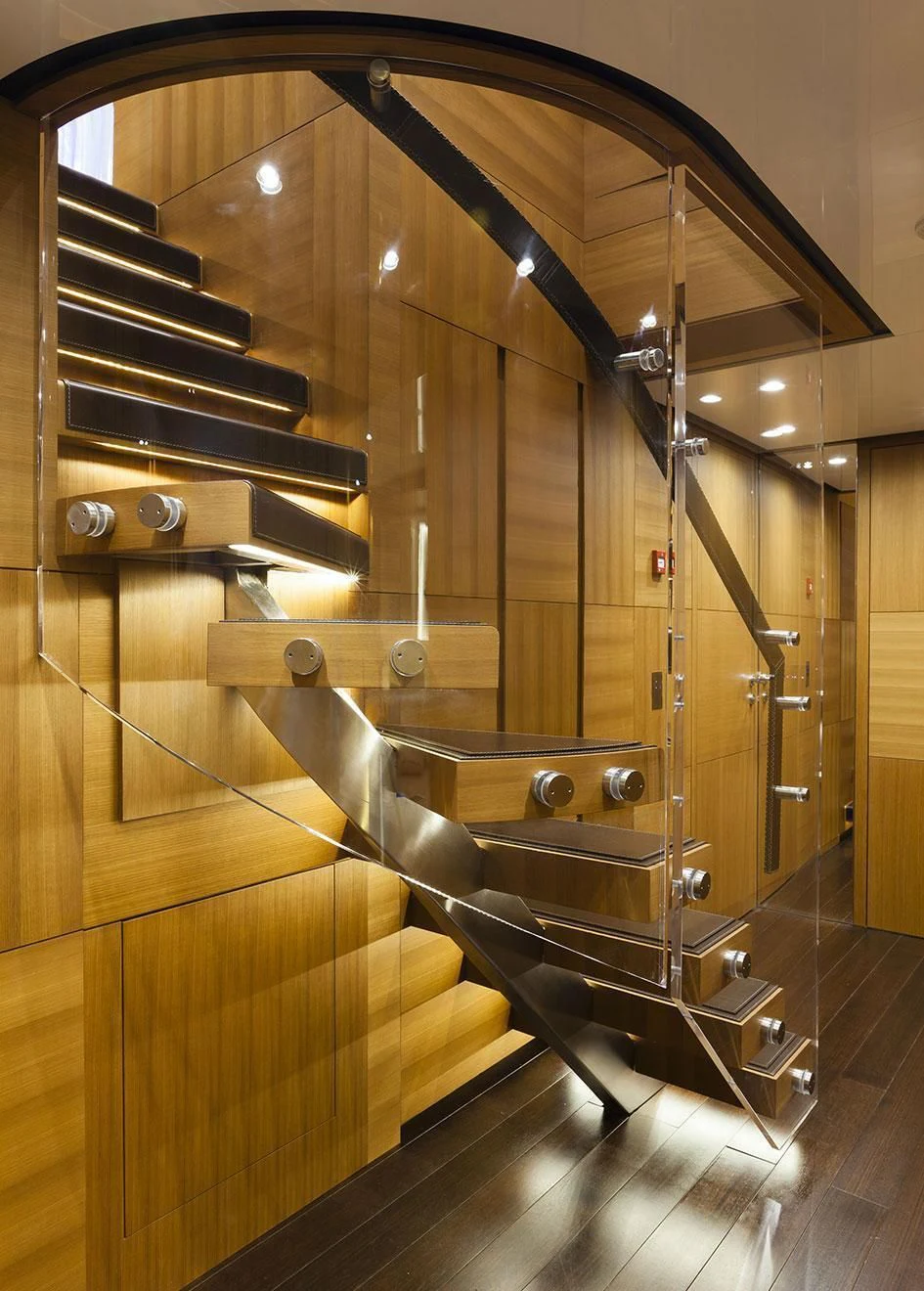 a wooden staircase inside a building aboard PACHAMAMA Yacht for Sale