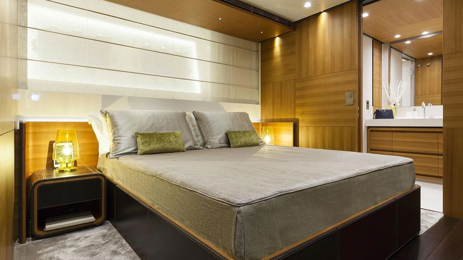 a bed in a room aboard PACHAMAMA Yacht for Sale