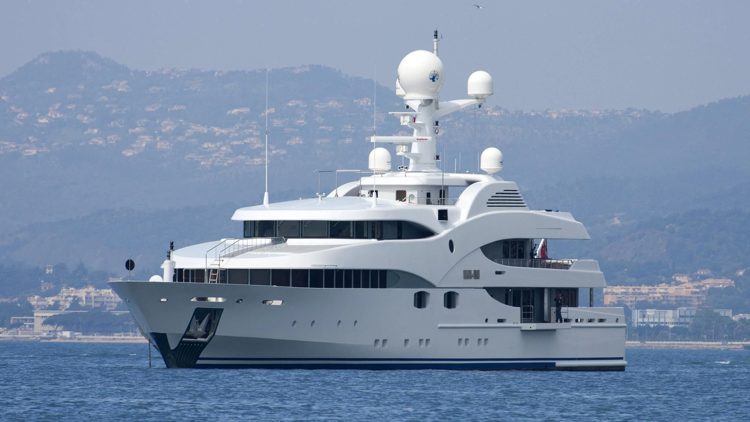 a large white boat in the water aboard NOURAH OF RIYAD Yacht for Sale