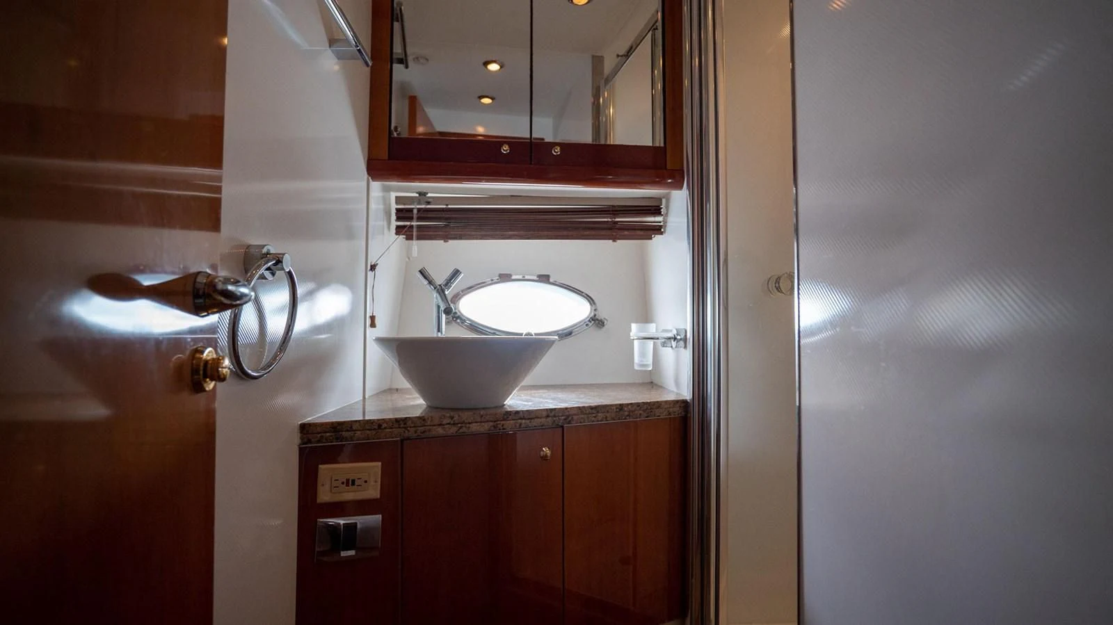 a sink and a mirror in a bathroom aboard HAN SOLO Yacht for Sale