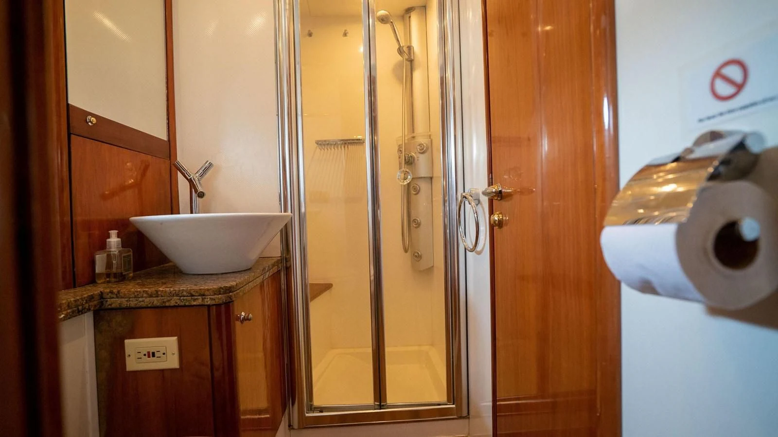 a bathroom with a sink and a shower aboard HAN SOLO Yacht for Sale
