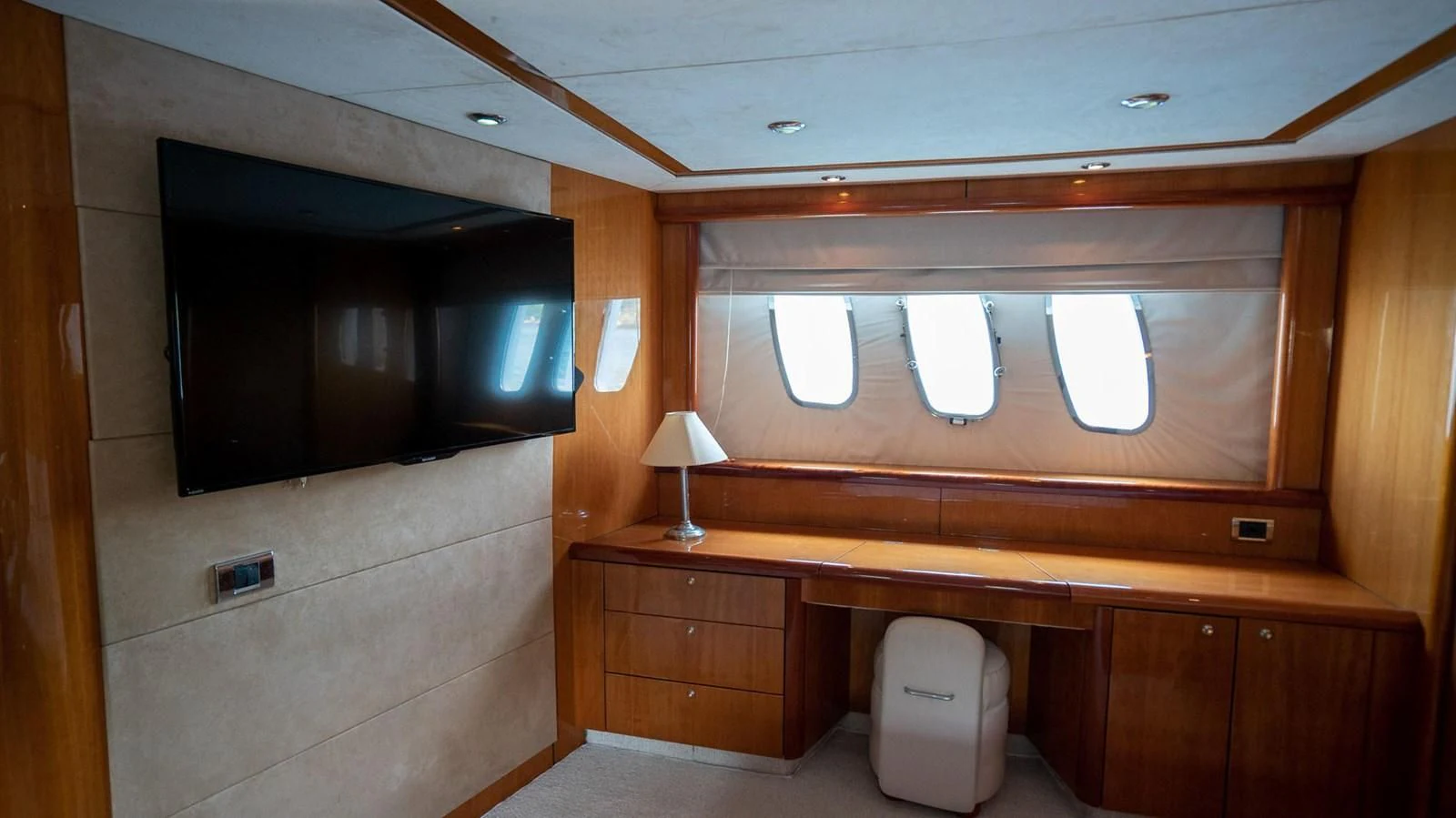 a room with a tv and a toilet aboard HAN SOLO Yacht for Sale