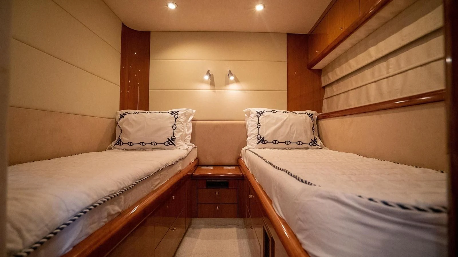 a couple of beds in a room aboard HAN SOLO Yacht for Sale