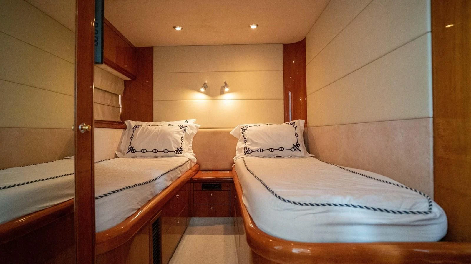 a couple of beds in a room aboard HAN SOLO Yacht for Sale