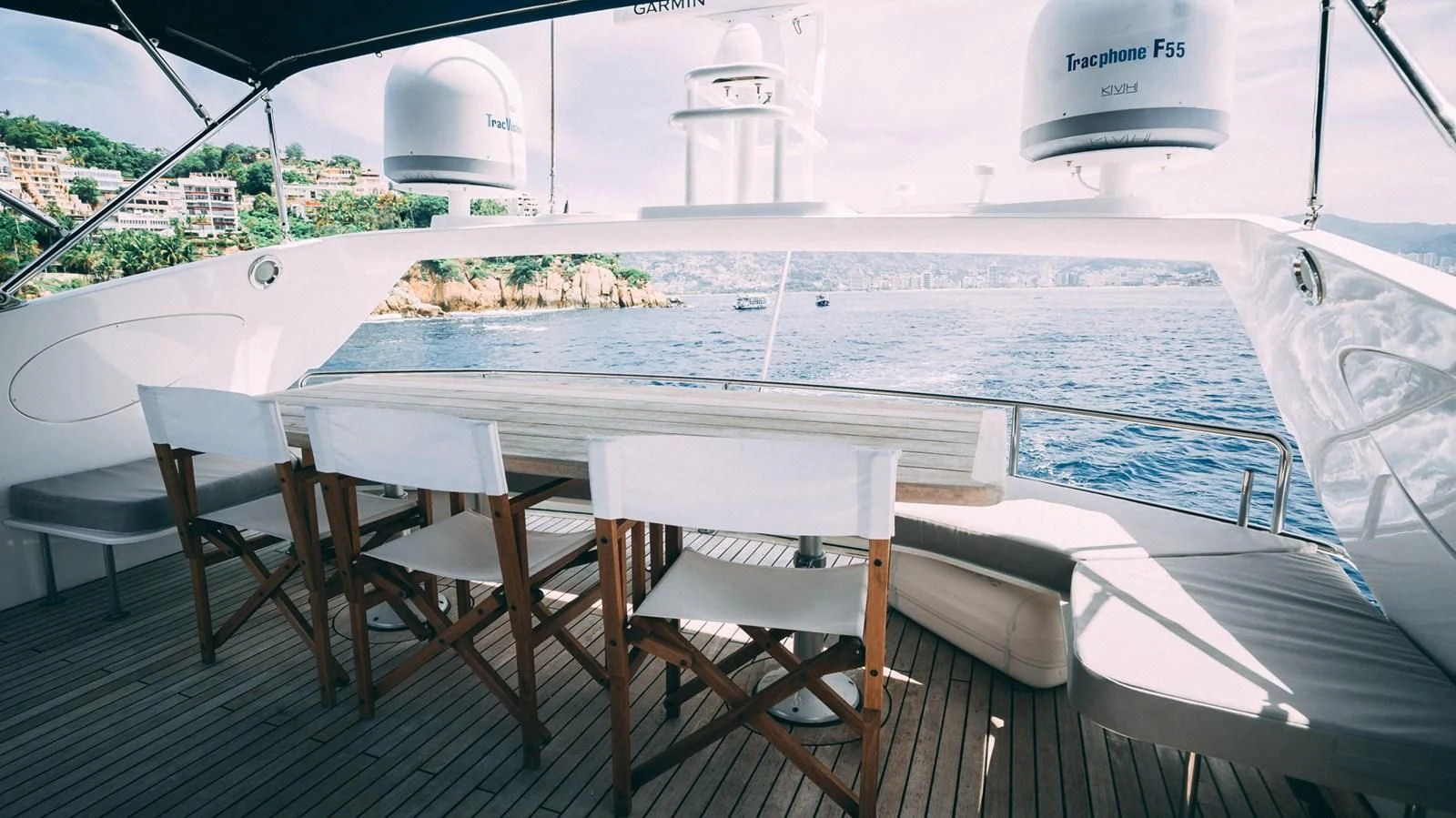 a table and chairs on a deck aboard HAN SOLO Yacht for Sale
