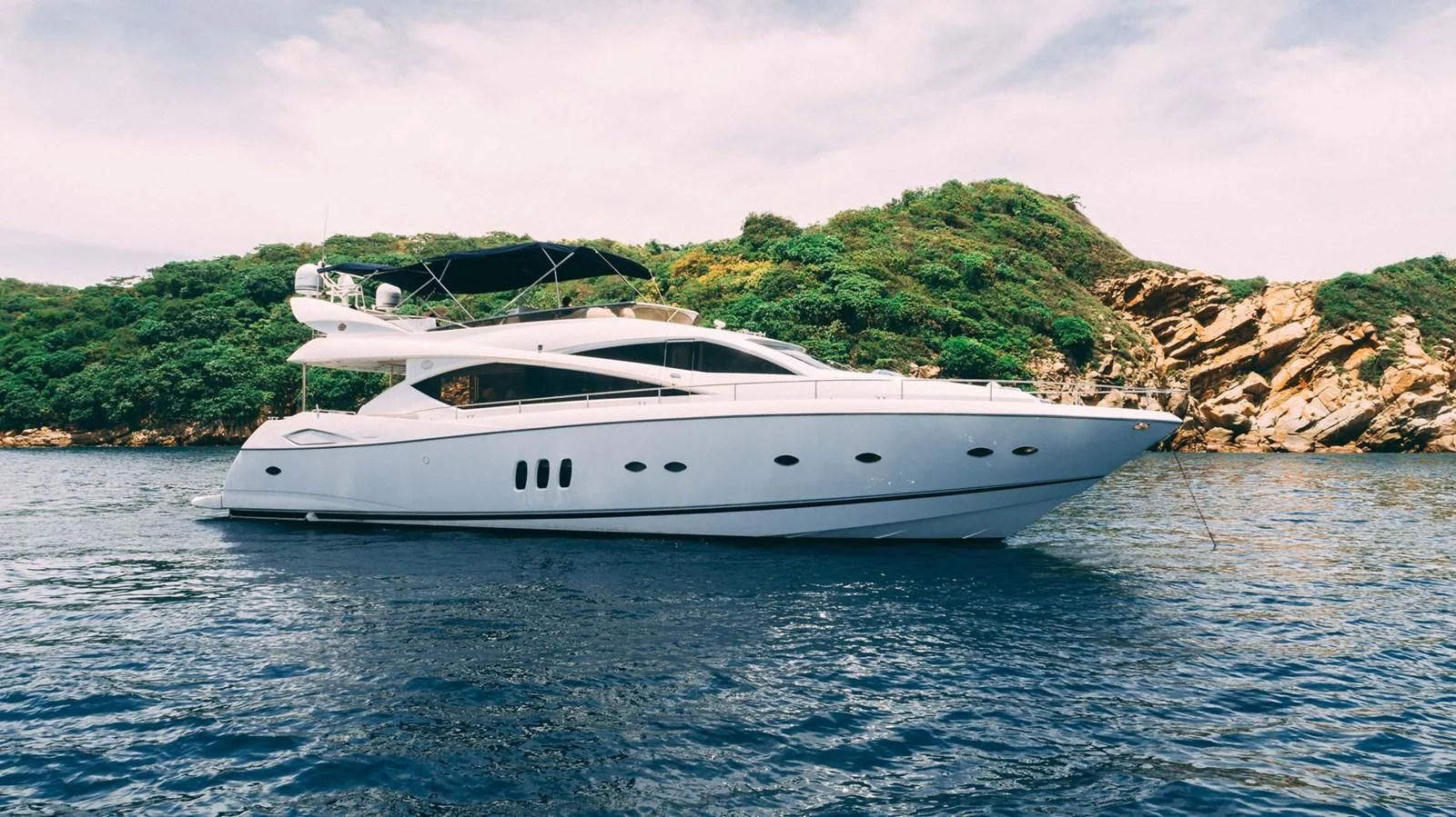 a white yacht on the water aboard HAN SOLO Yacht for Sale