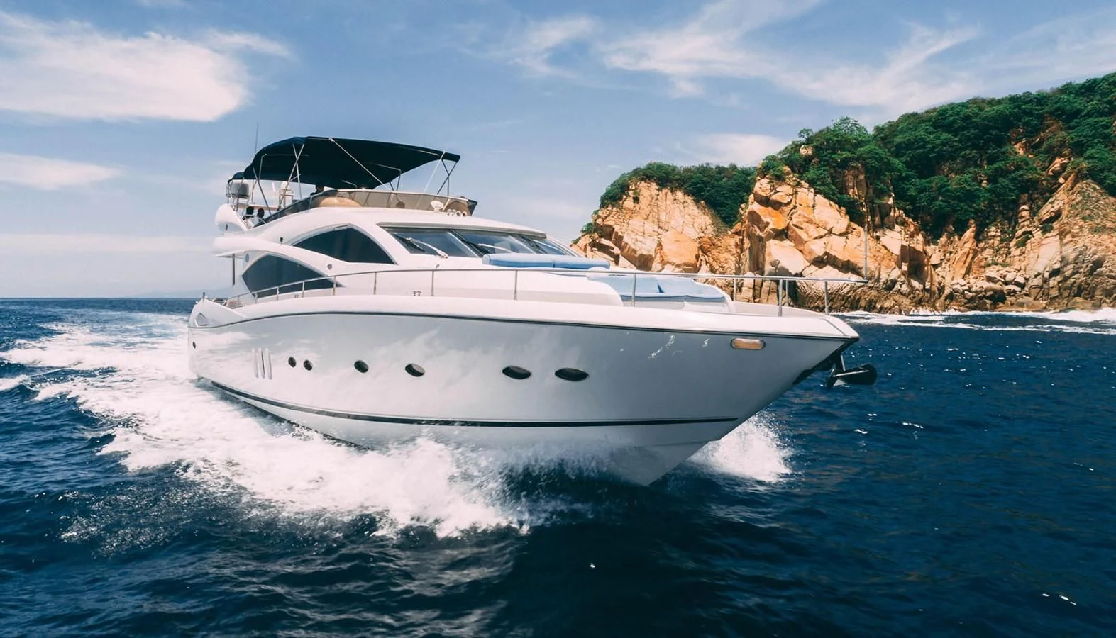 a white yacht on the water aboard HAN SOLO Yacht for Sale