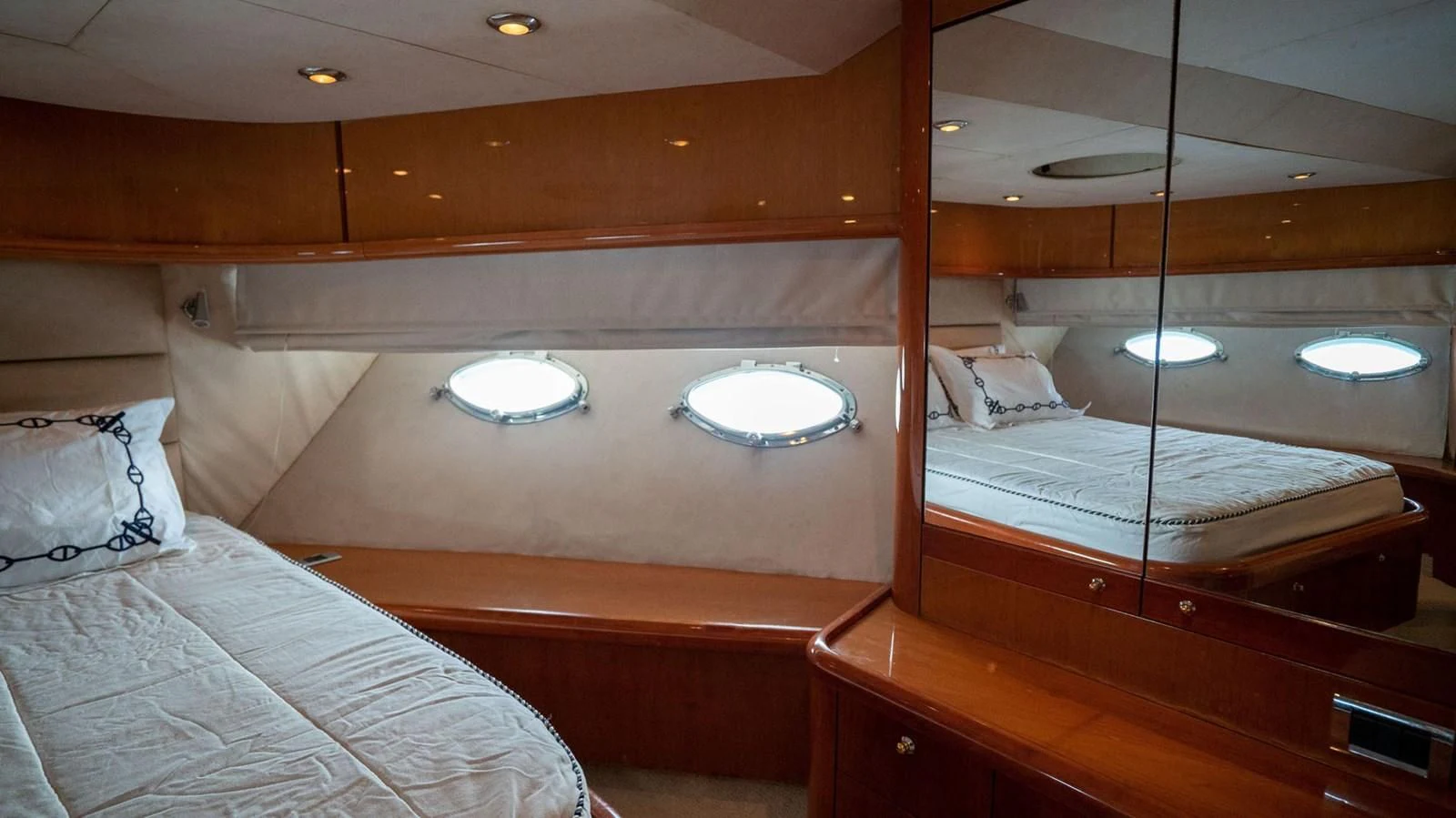 a room with a couple of beds aboard HAN SOLO Yacht for Sale