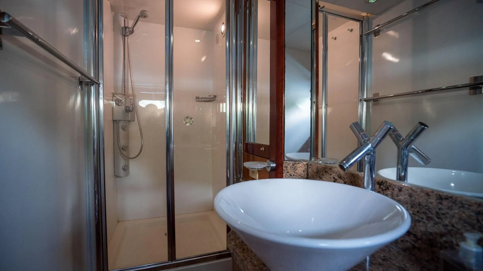 a bathroom with a sink and shower aboard HAN SOLO Yacht for Sale