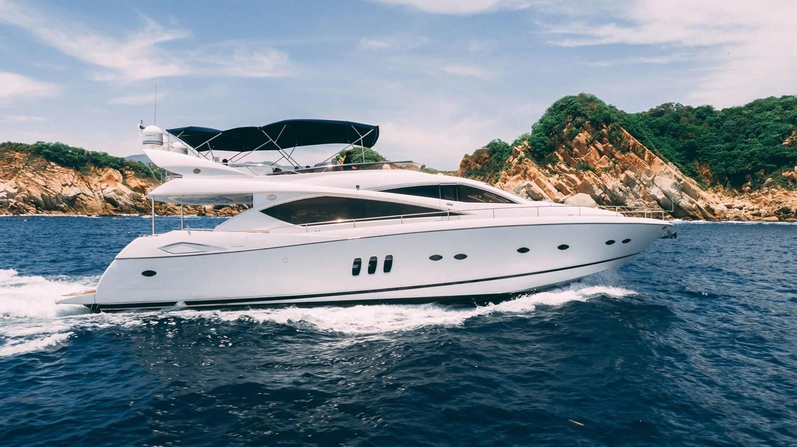 a white yacht on the water aboard HAN SOLO Yacht for Sale