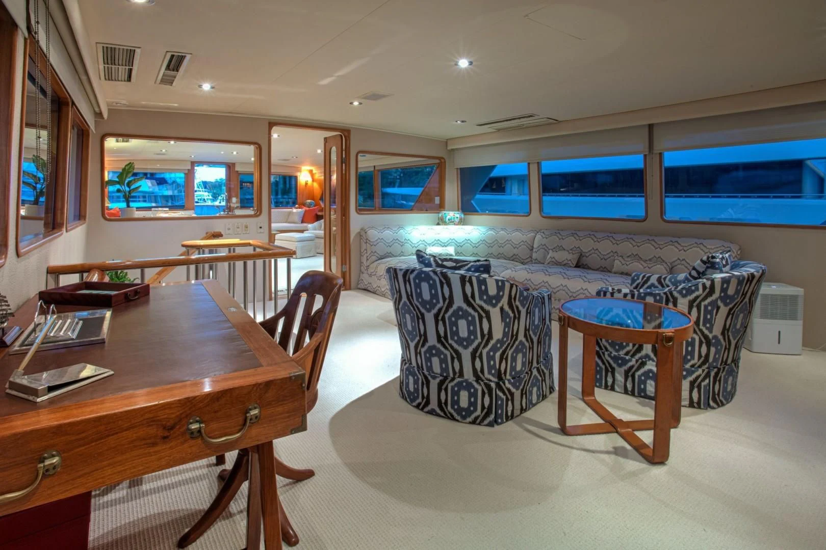 a living room with a couch and a table aboard ZANTINO III Yacht for Sale