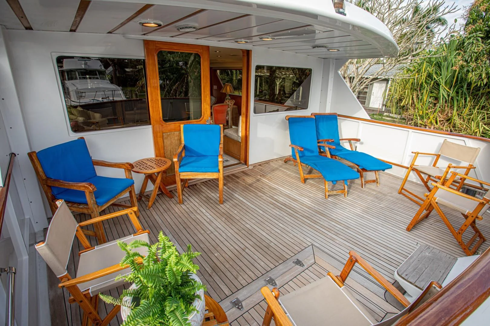 a room with chairs and tables aboard ZANTINO III Yacht for Sale