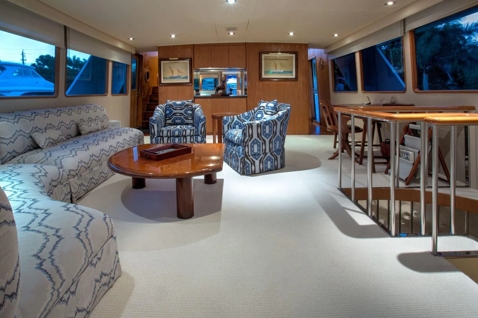 a living room with a table and chairs aboard ZANTINO III Yacht for Sale