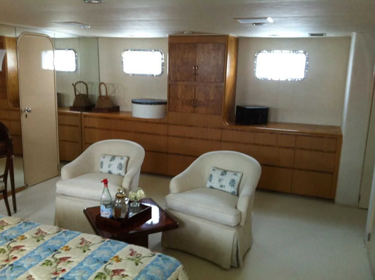 a room with a couch and a table aboard ZANTINO III Yacht for Sale