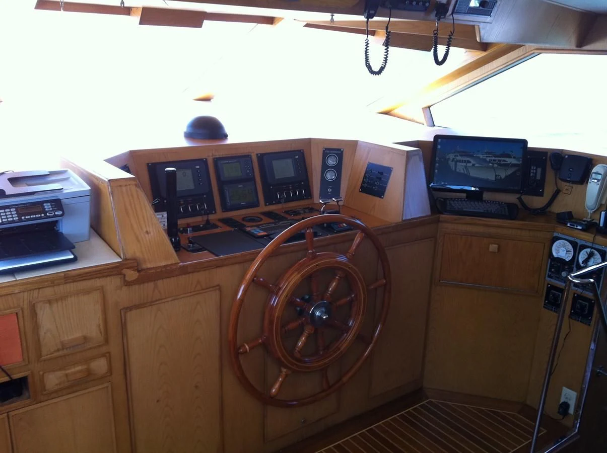 a wooden cabinet with a fan and a fan aboard ZANTINO III Yacht for Sale