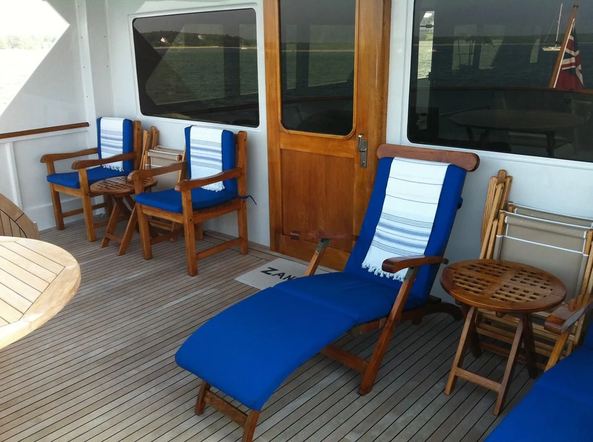 a group of chairs in a room aboard ZANTINO III Yacht for Sale
