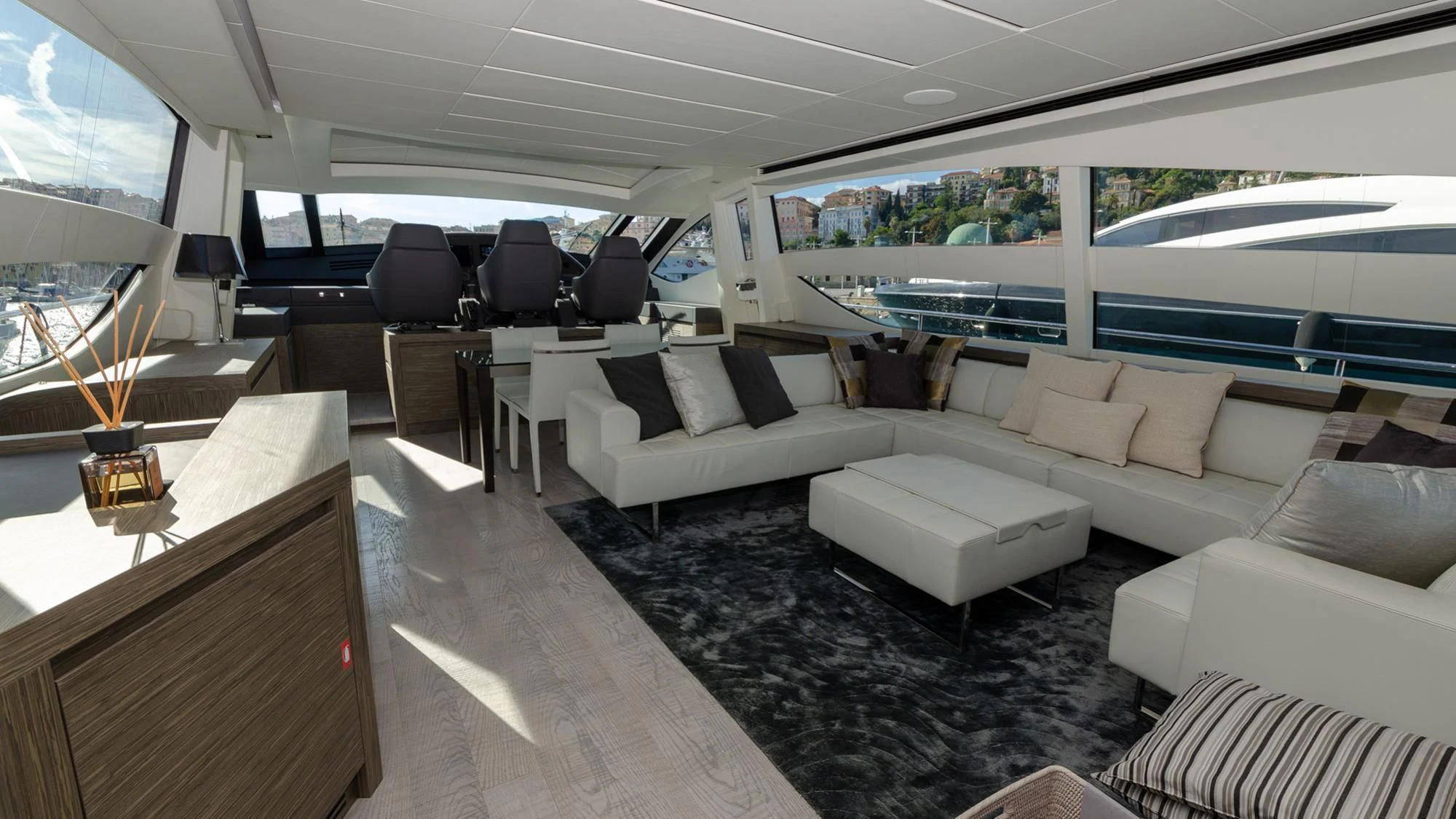 a room with a couch and a table and a tv aboard BAGHEERA Yacht for Sale