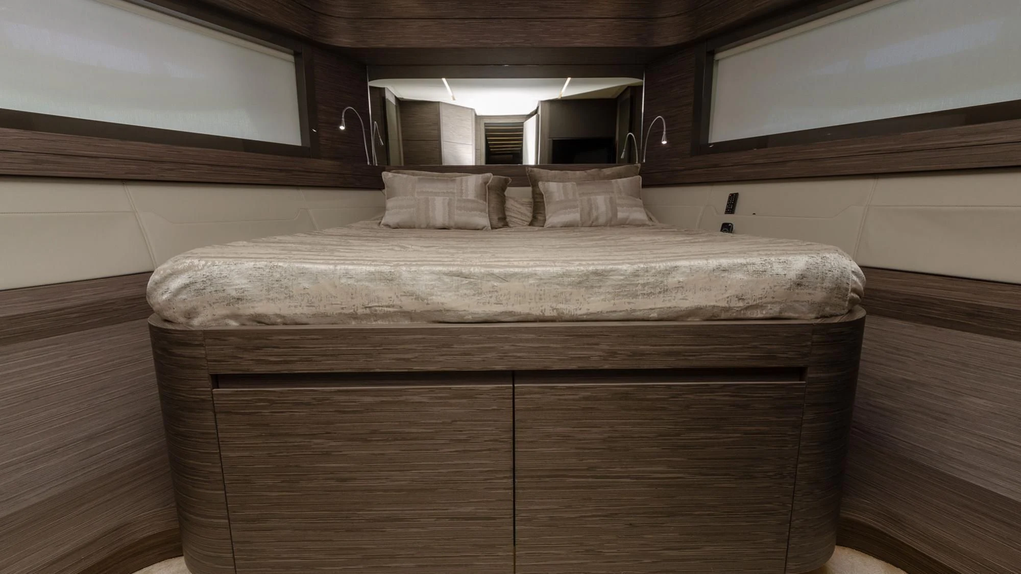 a bed with a white cover aboard BAGHEERA Yacht for Sale
